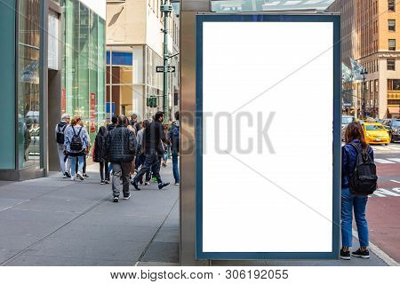 Blank Billboard At Bus Stop For Advertising, New York City Buildings And Street Background
