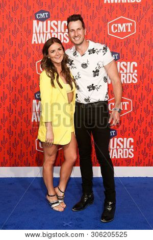 NASHVILLE - JUN 5: Russell Dickerson (R) and wife Kailey attend the 2019 CMT Music Awards at Bridgestone Arena on June 5, 2019 in Nashville, Tennessee.