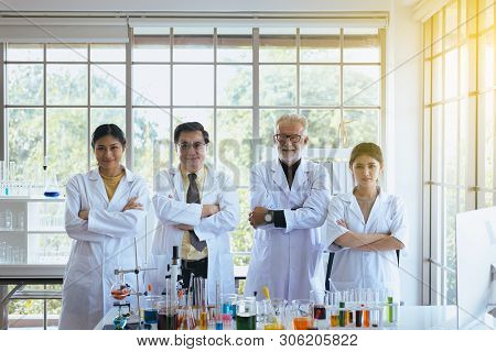Scientists Standing And Cross Arms,group Of Diversity People Teamwork In Laboratory,success And Rese