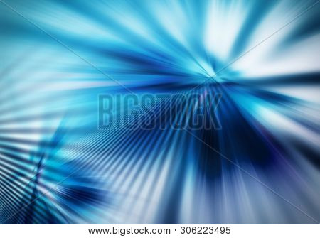 abstract background with straight rays of spreading light in blue colour