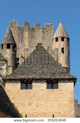 The Medieval Chateau De Beynac Rising On A Limestone Cliff Above The Dordogne River. France, Dordogn