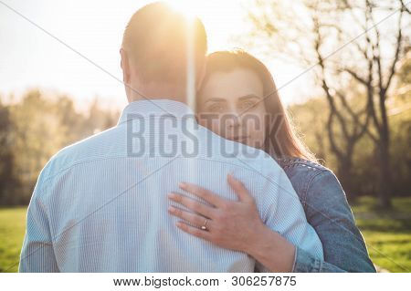 A Young Couple Spends Time Together Outdoors. Couple Having Fun Summer Time.