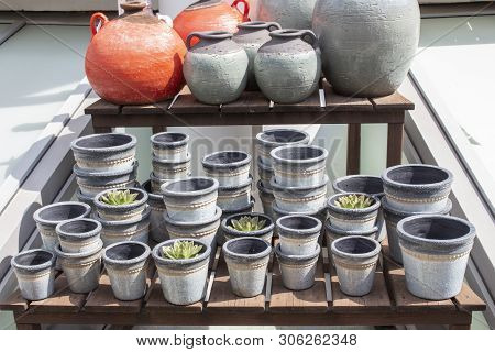 Gray, Grained Clay Flower Pots, Shop Window For Gardening And Growing Potted Plants And Flowers. Cap