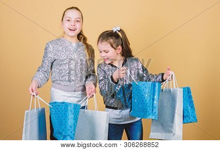 Children Hold Bunch Packages. Kids Fashion. Expect More. Pay Less. Girls Sisters Friends With Shoppi