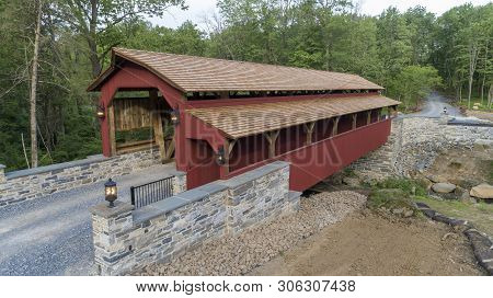 Rebuilt Pennsylvania Dutch Covered Kissing Bridge On A Sunny Day