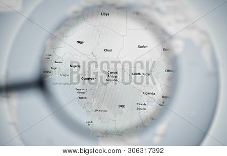 Ukraine, Odessa - April 25, 2019:  Google Maps Planet Earth Globe Through Magnifying Glass