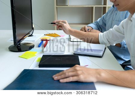 Woman And Man Work For Education Or Business On The Table