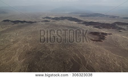 Aerial Airplane Panoramic View To Nazca Plateau With Geoglyph Lines , Ica Region, Peru