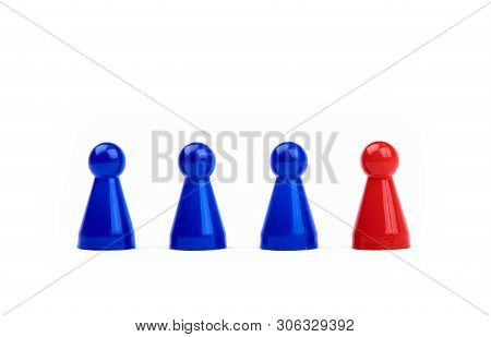 Three Plastic Blue Game Pieces As A Team And Next To Them A Red Piece As Leader Or Different. Isolat