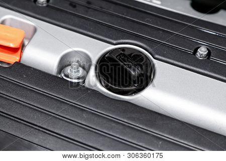 Close Up Of The Oil Filling Plug In Car Engine Compartment. Neck Of Engine For Engine Oil.