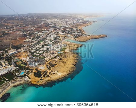 Top View Of The City Of Cyprus And The City Of Ayia Napa. Air View Of The Resort Mediterranean Coast