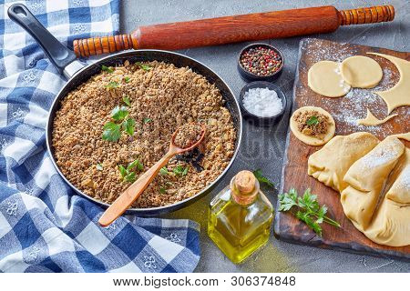 Ground Liver With Onion Fried In A Skillet, Ingredient Of Filling For Pierogies, Raw Dough And Uncoo