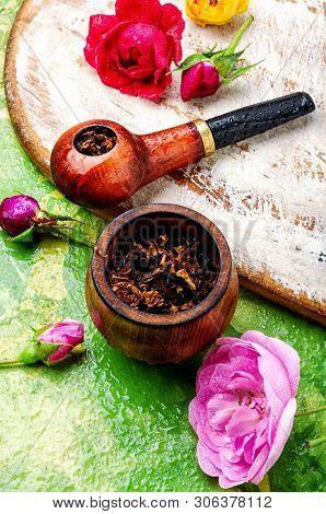Smoking Pipe And Floral Tobacco