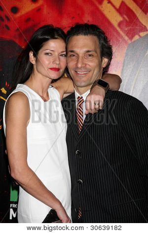 LOS ANGELES - JAN 25:  Jill Hennessy, husband arrives at  the 