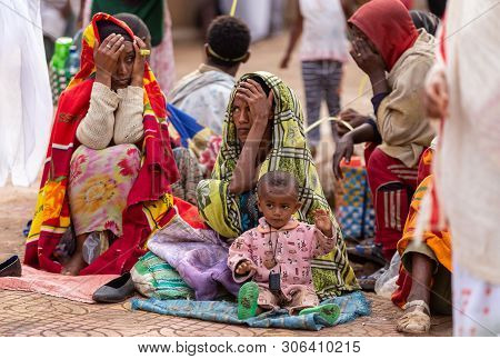 Bahir Dar, Ethiopia, April 21th. 2019, Orthodox Christian Woman Pilgrim With Children At Worship On 