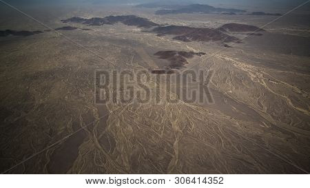 Aerial Airplane Panoramic View To Nazca Plateau With Geoglyph Lines , Ica Region, Peru