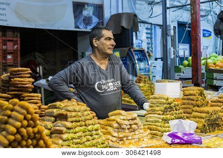 Tel Aviv , Israel - 21 November 2017: Sellers On The Old Grocery Street Nahalat-benjamin