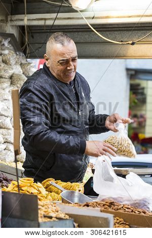 Tel Aviv , Israel - 21 November 2017: Sellers On The Old Grocery Street Nahalat-benjamin