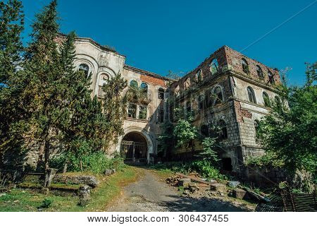 Ruined Overgrown Hospital In Ghost Mining Town Akarmara, Consequences Of War In Abkhazia, Green Post
