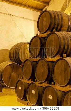 Vintage Wine Cellar With Old Oak Barrels, Production Of Fortified Dry Or Sweet Marsala Wine In Marsa