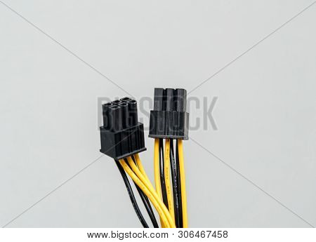 Close-up Detail Of New Power Adapter Cable Dongle Splitter Against Gray Background - Cable Used In C