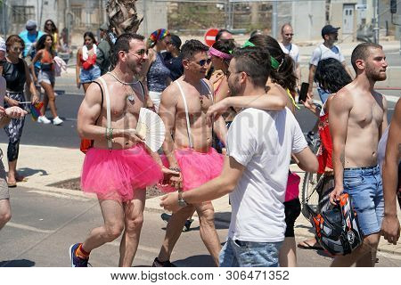 The Annual Parade Lgbt. Gay Walking In The Gay Pride Parade. Parade Of Tolerance. Rainbow Flags At G