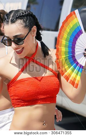 The Annual Parade Lgbt. Girl Lesbian In The Gay Pride Parade. Parade Of Tolerance. Rainbow Flags At 