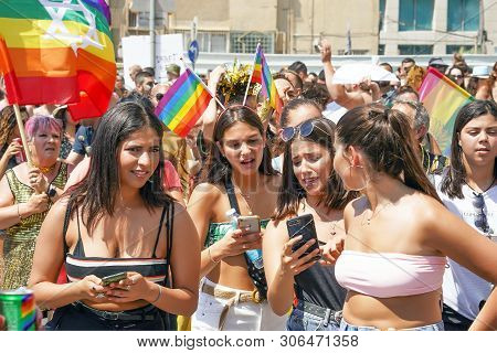 The Annual Parade Lgbt. Girls Lesbians Walking In The Gay Pride Parade. Parade Of Tolerance. Rainbow