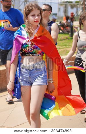 The Annual Parade Lgbt. Girl Lesbian Walking In The Gay Pride Parade. Parade Of Tolerance. Rainbow F