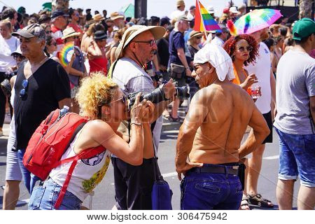 The Annual Parade Lgbt. Gay And Lesbians Walking In The Gay Pride Parade. Parade Of Tolerance. Rainb