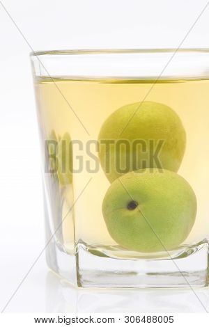 Japanese Plum Wine Called Umeshu On White Background
