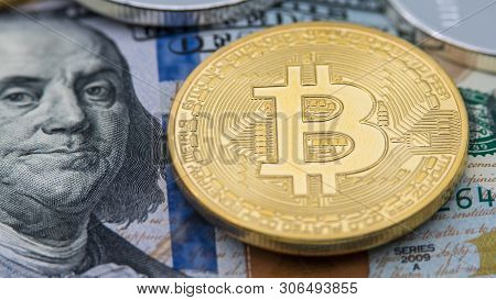 Physical Metal Golden Bitcoin Currency Over 100 American Dollar Bill. Btc