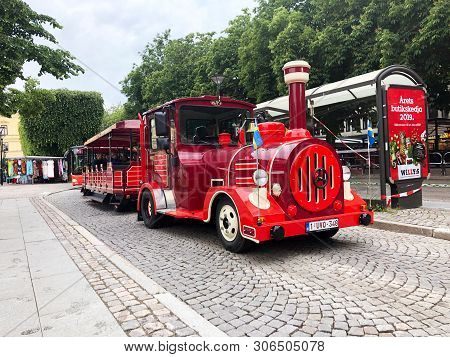 Karlstad, Sweden - June 14, 2019: A Red Dotto Train In The City Center On Sightseeing Tour.
