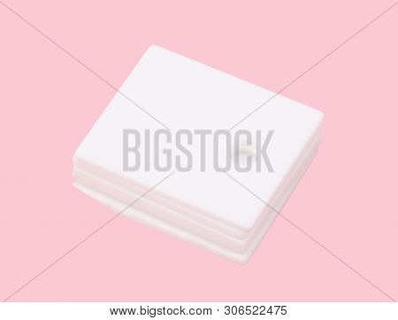 Ceramic Insulator On Isolated Pink Background At Dry Sunny Summer Day