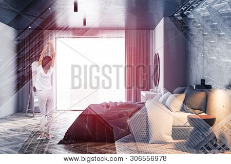 Woman In Panoramic Bedroom With Mirror