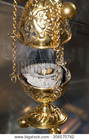 Hand Censer With Burning Incense On Hot Charcoal Inside, During Celebration In Orthodox Church. Frag