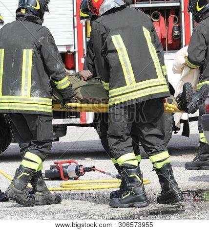 Stretcher Bearer After The Accident Carrying The Injured Person