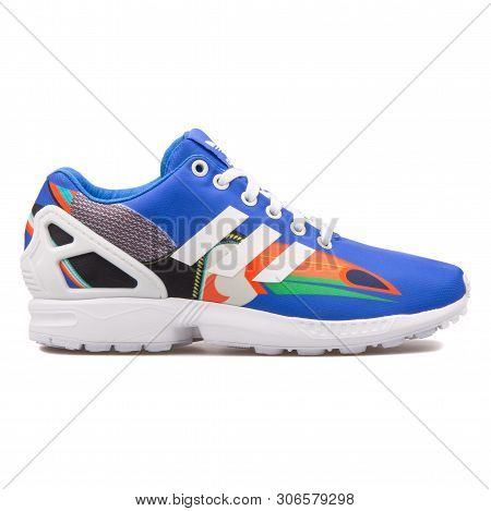Vienna, Austria - August 10, 2017: Adidas Zx Flux Blue, White And Multi Color Sneaker On White Backg