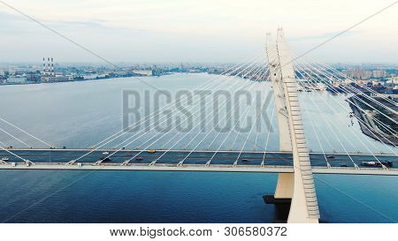Motion Past Bridge Pylons And Cables Cars Speed Downwards