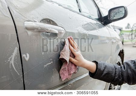 Car Wash With Foam In Car Wash Station. Carwash. Washing Machine At The Station. Car Washing Concept
