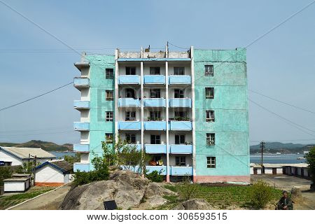 Wonsan, North Korea - May 4, 2019: Typical Apartment House In Residential District At Suburban Of Wo