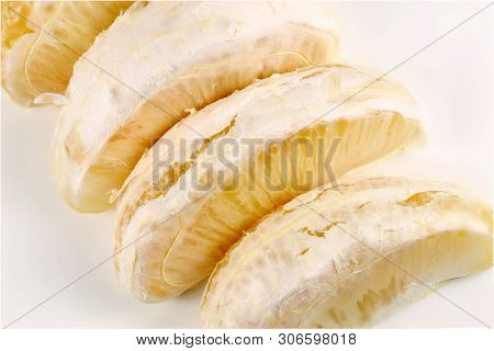 Unpeeled Pomelo Segment Showing The Membranous Material Around The Pulp, Which Is The Juicy Part Of 