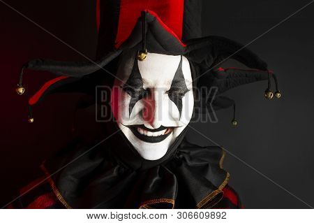 Cute Laughing Jester Woman With Eyes Closed.