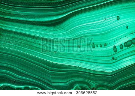 The Green Malachite. An Ornamental Stone. Photo Texture. Macro.