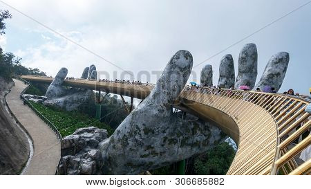 Danang, Vietnam - Jun 3, 2019: The Golden Bridge Is Lifted By Two Giant Hands In The Tourist Resort 
