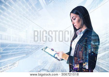 Portrait Of Caucasian Businesswoman With Tablet