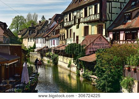 Colmar, France - April 18, 2019. Romantic Boat Trip Along The Canal In The Little Venice Of Colmar. 