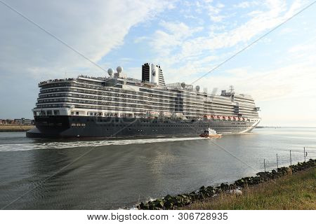 Ijmuiden, The Netherlands -june, 9th 2019: Nieuw Statendam Leaving Ijmuiden Sea Lock, Joined By Pilo