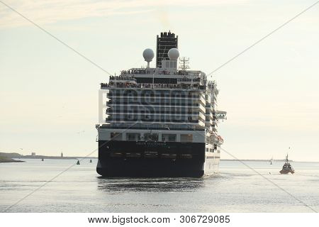 Ijmuiden, The Netherlands -june, 9th 2019: Nieuw Statendam Leaving Ijmuiden Sea Lock, Joined By Pilo