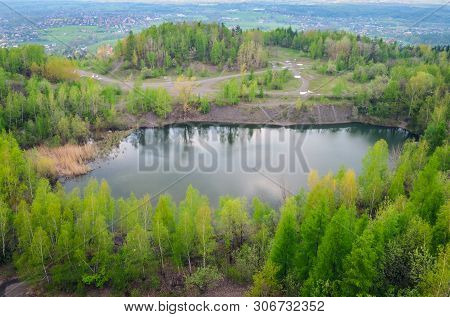 Beautiful Spring Mountain Landscape. Quarry In The Mountains By The Lake.